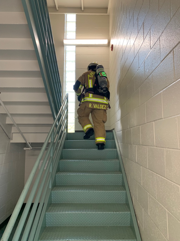 Firefighter doing a stair clim